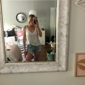 white long tank, very easily styled